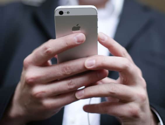 A new iPhone bug has been reported that puts users personal files at risk. Picture: Yui Mok/PA Wire