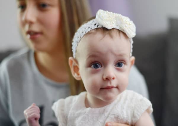 Skyla Robertson, with mum Nicole McGowan, at home in Johnstone, Renfrewshire, after celebrating her 1st birthday.
