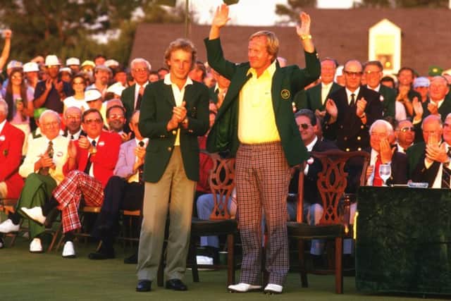 Jack Nicklaus receives the Green Jacket from Bernhard Langer of Germany after the US Masters at Augusta in 1986. Picture: David Cannon/Allsport