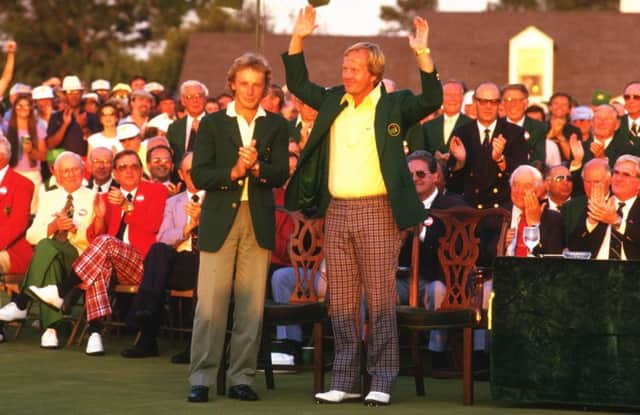 Jack Nicklaus receives the Green Jacket from Bernhard Langer of Germany after the US Masters at Augusta in 1986. Picture: David  Cannon/Allsport