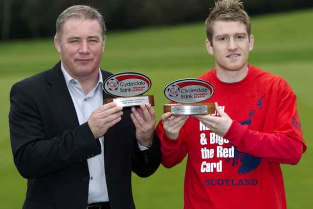 Then manager Ally McCoist with midfield star Steven Davis. Picture: SNS