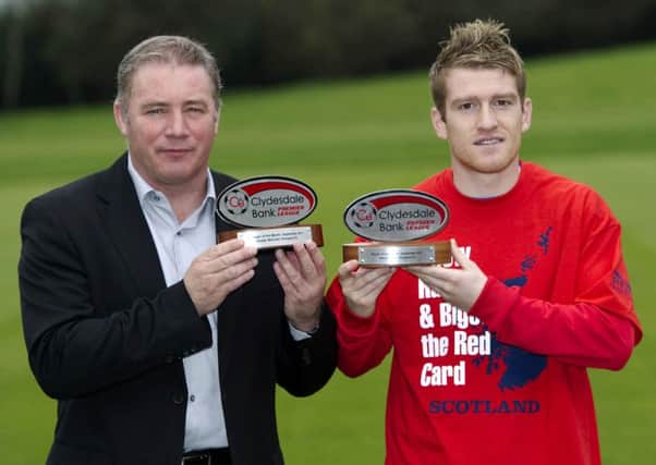 Then manager Ally McCoist with midfield star Steven Davis. Picture: SNS