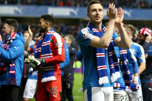 Danny Wilson applauds the fans after Rangers clinched the Championship title. How will they fare in the top flight? Picture: Andrew Milligan/PA Wire