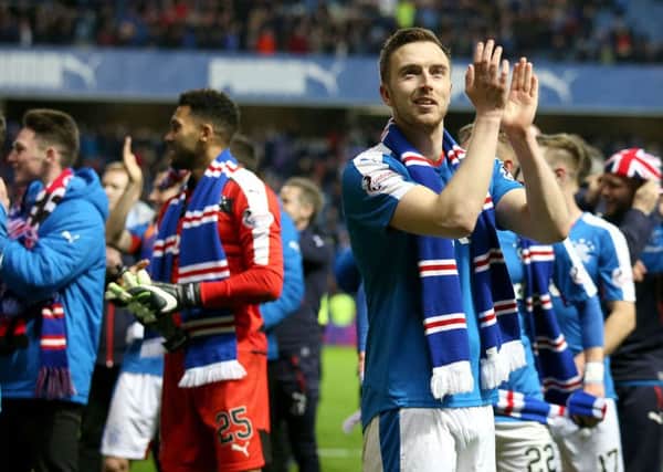 Danny Wilson applauds the fans after Rangers clinched the Championship title. How will they fare in the top flight? Picture: Andrew Milligan/PA Wire