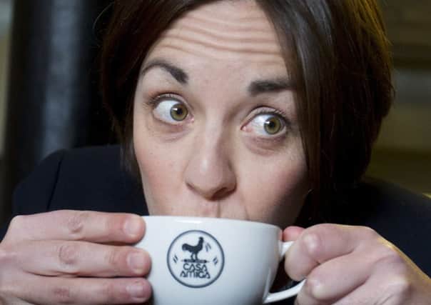 Scottish Labour leader Kezia Dugdale visits Casa Amiga, on Leith Walk, where she made and drank coffee with supporters. Picture: SWNS