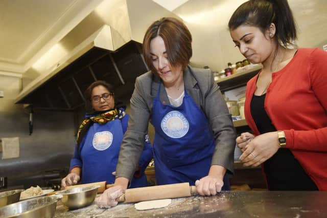 Scottish Labour leader Kezia Dugdale visits Punjabi Junction on Leith Walk to learn how to make chapatis. Picture: Greg Macvean