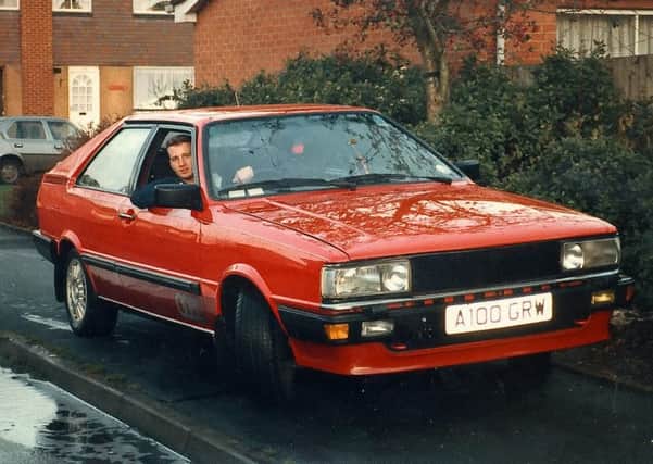 Keith Evans as a 21-year-old carpentry trainee back in 1987 in his beloved Audi. Picture: SWNS/Hemedia
