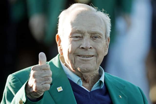 Arnold Palmer gives a thumbs up on the first tee at Augusta National today.  Picture: AP