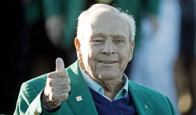 Arnold Palmer gives a thumbs up on the first tee at Augusta National today.  Picture: AP