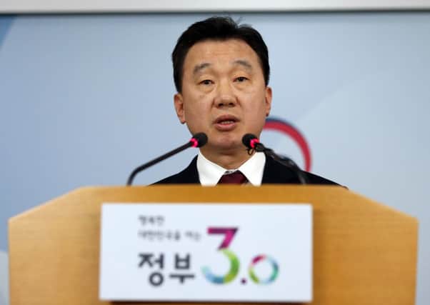 South Korean Unification Ministry spokesman Jeong Joon Hee speaks about North Korean workers' defection to South Korea. Picture: AP