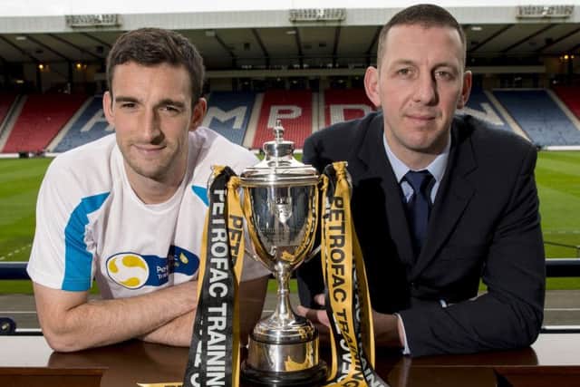 Lee Wallace, left, and Graeme Smith look ahead to the Petrofac Training Cup final tomorrow. Picture: SNS.