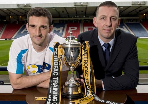 Lee Wallace, left, and Graeme Smith look ahead to the Petrofac Training Cup final tomorrow. Picture: SNS.