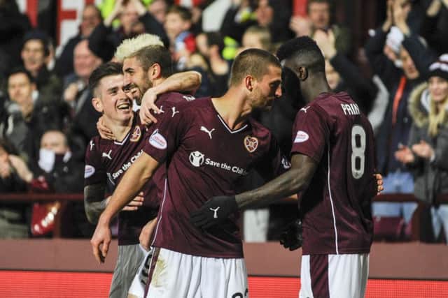 Hearts celebrate Juanma's second goal. Picture: Andrew O'Brien