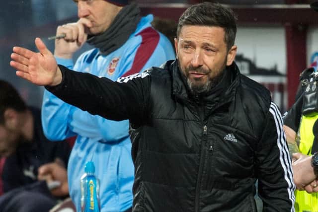 Aberdeen manager Derek McInnes knows the defeat by Hearts has damaged his side's title bid, possibly fatally. Picture: Rob Casey/SNS