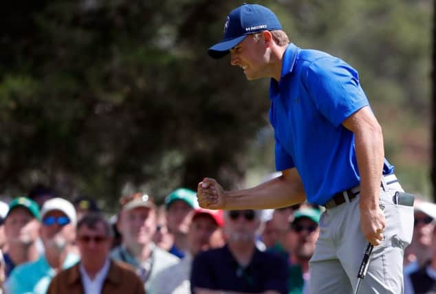 Jordan Spieth reacts to holing a par putt at the sixth in his second round. Picture: Getty Images