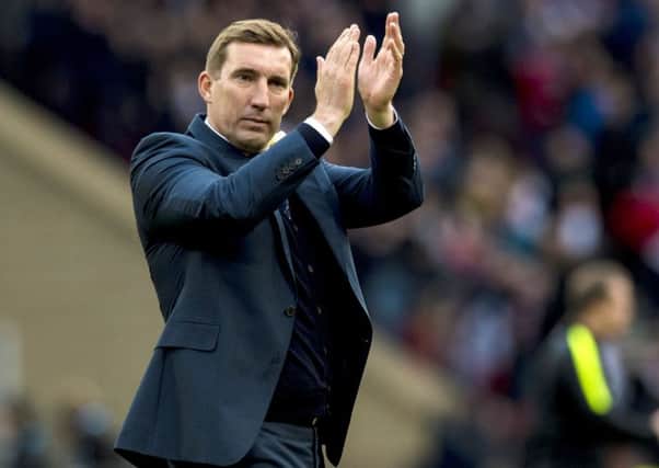 Alan Stubbs applauds his side during their League Cup defeat by Ross County