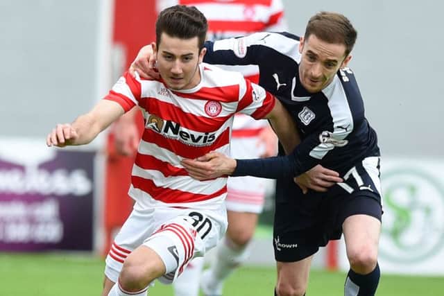 Hamilton's Steven Boyd (left) runs from Dundee's Nick Ross. Picture: SNS Group