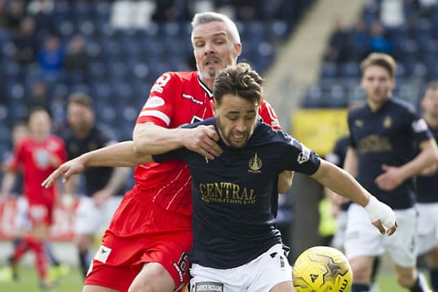 St Mirren's Jim Goodwin (left) battles for the ball against Tom Taiwo. Picture: SNS Group
