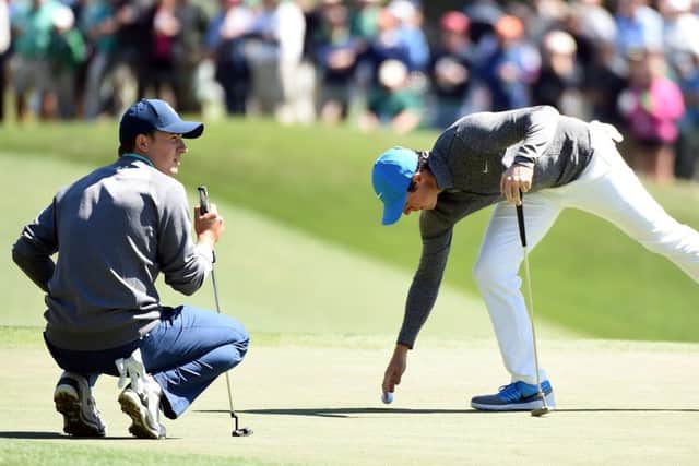 Rory McIlroy, right, and Jordan Spieth went head to head on day three of the Masters.  Picture: Harry How/Getty Images