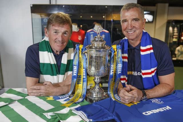 Former Old Firm favourites Kenny Dalglish, left, and Graeme Souness get to grips with one another in Glasgow yesterday. Picture: Steve Welsh