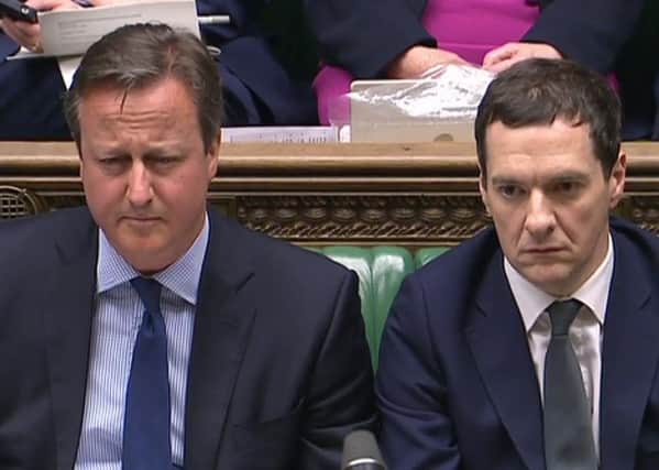 David Cameron and George Osborne have both published details of their tax affairs. Both gained from the top rate tax cut. Picture: Getty