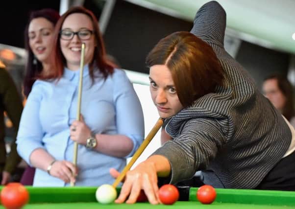 Labour leader Kezia Dugdale is on the ball at Glasgow University with student Eva Murray, 21. Ms Dugdale said Labour would keep tuition free. Picture: Getty