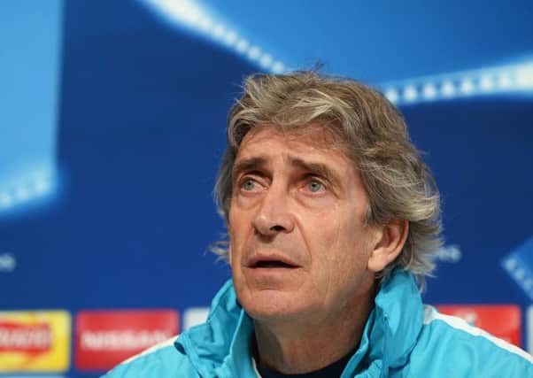 Manchester City manager Manuel Pellegrini believes neither side is favourite following the 2-2 draw with PSG in Paris last week. Picture: Getty