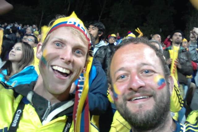 Ally Brown, right, watching the Colombian national football team