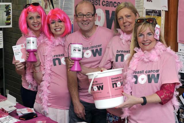 Fundraisers at a cancer awareness event, proceeds to Breast Cancer Now.