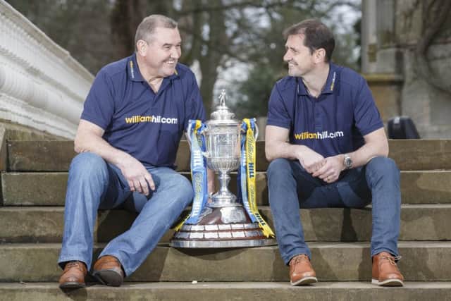 Jackie McNamara senior and junior at Carlowrie Castle to preview the William Hill Scottish semi-final between Dundee United and Hibs. Picture: Steve Welsh