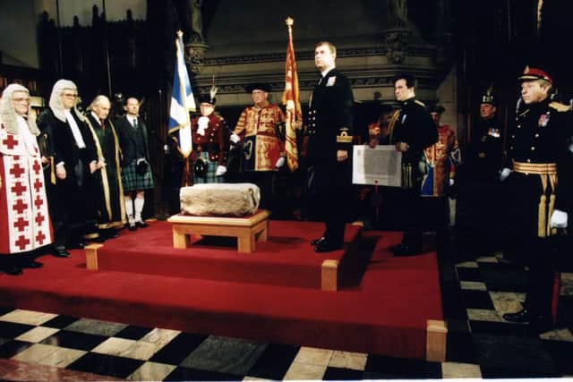 Prince Andrew stands beside the Stone of Destiny at the ceremony in Edinburgh Castle in 1996. Picture: Hamish Campbell