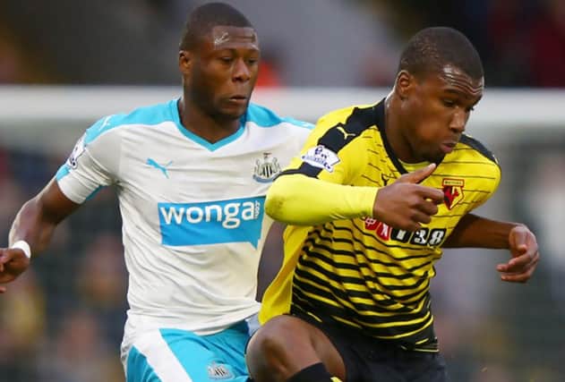 Obbi Oulare (right) shields the ball from Newcastle's Chancel Mbemba during an FA Cup clash. Picture: Getty Images