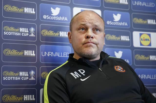 Mixu Paatelainen hosted an unscheduled press conference at Dundee Uniteds St Andrews training base yesterday to deal with the situation surrounding Gavin Gunning. Picture: Steve Welsh
