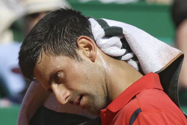 Novak Djokovic finds the going tough during his second-round defeat in Monaco. Picture: AP.