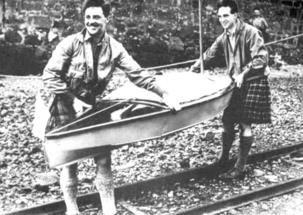 The Canoe Boys (left to right) James Adam and Sir Alastair Dunnett with one of their vessels. Picture: Contributed