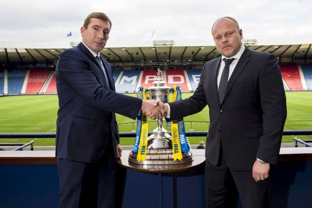 Hibs coach Alan Stubbs poses with Dundee United boss Mixu Paatelainen Picture: SNS