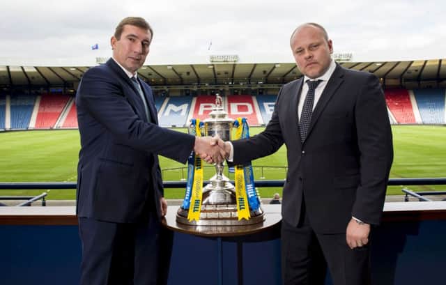 Hibs coach Alan Stubbs poses with Dundee United boss Mixu Paatelainen Picture: SNS