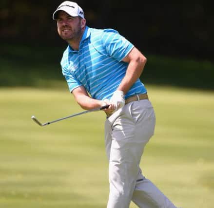 Richie Ramsay watches his second shot on the 18th hole at Real Club Valderrama. Picture: Getty Images