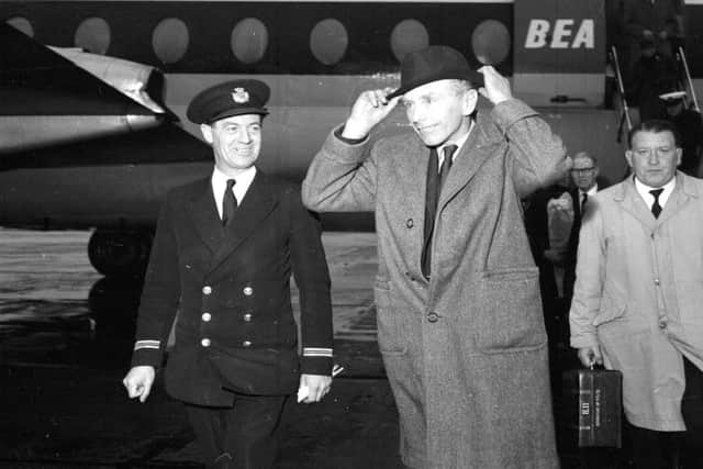 Foreign secretary Lord Home arrives at Renfrew airport in 1962 to campign in the Glasgow Woodside by-election. Picture: TSPL