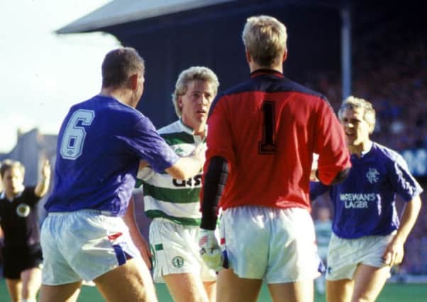 Rangers goalkeeper Chris Woods and Frank McAvennie see red during a 1987 Old Firm derby. Picture: SNS