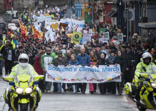 Protesters march in Edinburgh last year to demand government action to prevent climate change. Picture: Andrew OBrien