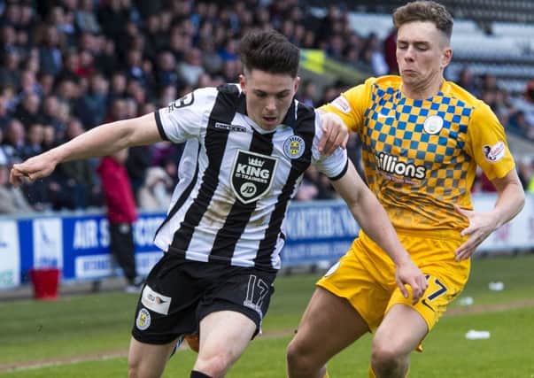 St Mirren's Lewis Morgan, left, is challenged by Mark Russell of Morton. Picture: Ross Parker/SNS