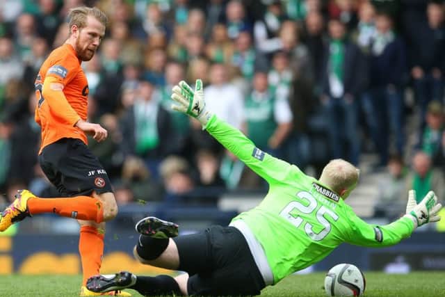 Hibs keeper Conrad Logan saves from Henri Anier of Dundee United. Picture: Ian MacNicol/Getty
