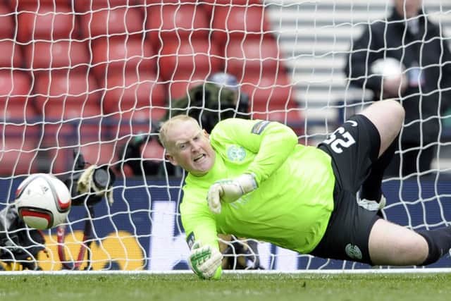 Conrad Logan of Hibs saves Billy Mckay of Dundee United's penalty in the shoot-out. Picture:

 Neil Hanna