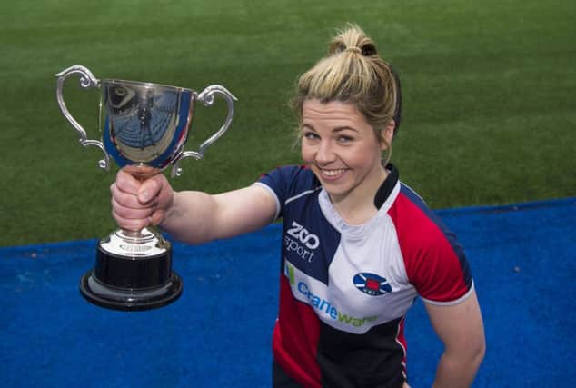 Lisa Martin of Murrayfield Wanderers got her hands on the cup. Picture: SNS/SRU