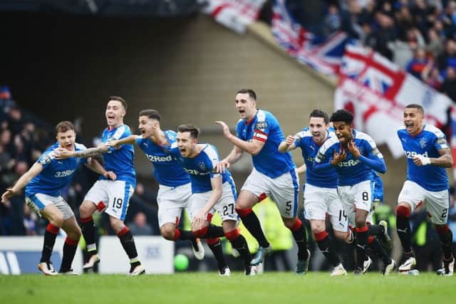The Rangers team go wild after watching Tom Rogic miss his penalty, booking the Ibrox side's place in the final. Picture: Getty