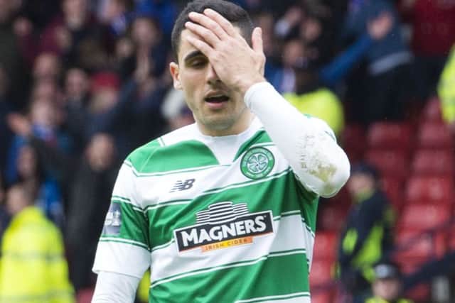 Tom Rogic, who had rescued Celtic in extra time, reacts after missing his penalty. Picture: SNS Group