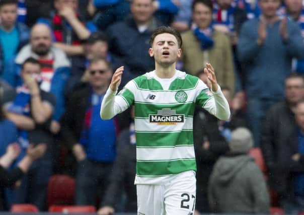 Celtic's Patrick Roberts walks a way after missing a golden chance against Rangers. Picture: Ian Rutherford