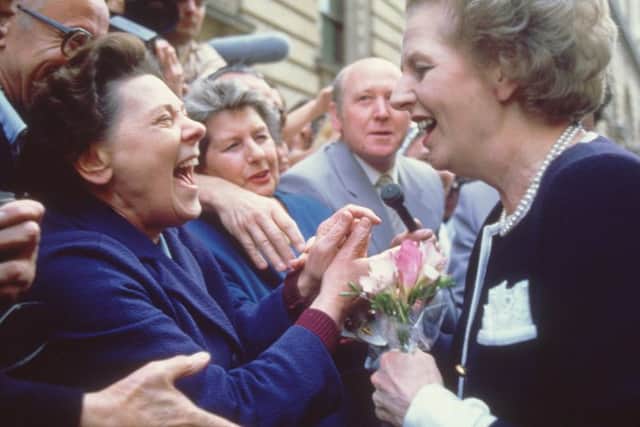 Former British prime minister Margaret Thatcher greets the crowds in Downing Street, London in 1987. Picture: Hulton Archive/Getty Images)