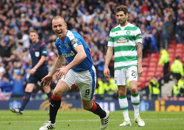 Kenny Miller celebrates after giving Rangers an early lead. Picture: John Devlin